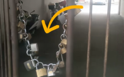 小区大门挂29把锁火了 居民:防外来车辆抢车位 各开各的锁 !